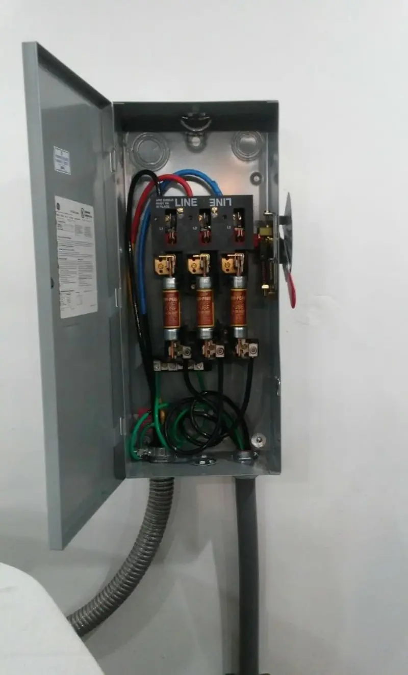 Three-phase disconnect switch installed for Smoke Detector Installation in Yankee Springs